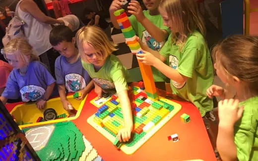 a group of children playing a board game