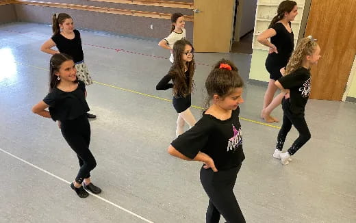a group of girls dancing
