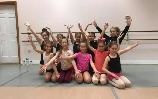 a group of girls posing for a photo
