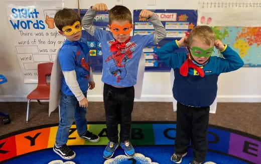 a group of kids wearing clothing