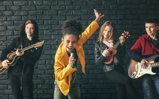 a group of people holding instruments