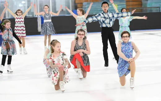 a group of people ice skating