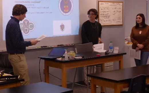 a group of people in a classroom