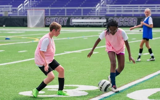 a group of people playing football