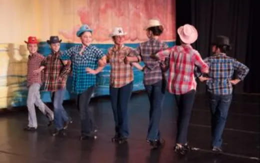 a group of people wearing hats