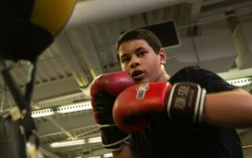 a man wearing boxing gloves