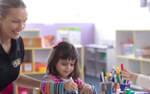 a person and a girl painting