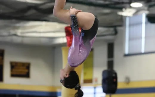 a person doing a back bend