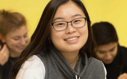 a woman smiling for the camera