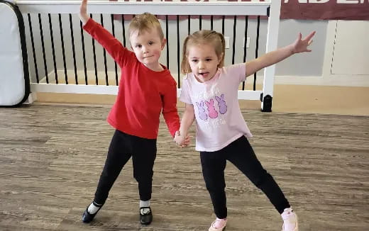 two children posing for the camera
