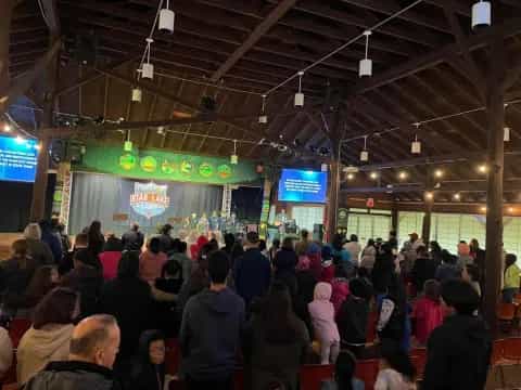 a large crowd of people in a building