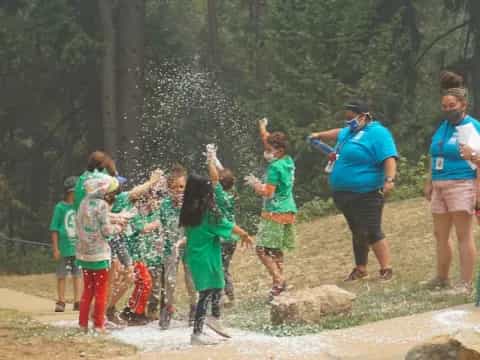 a group of people playing in the water