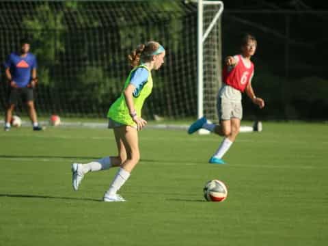 a couple of girls playing football