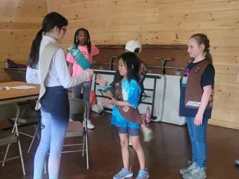 a group of people standing in a room