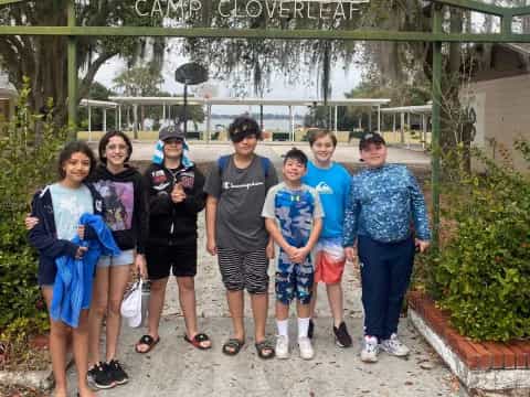 a group of people posing for a photo