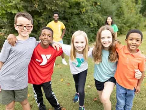 a group of people posing for a photo