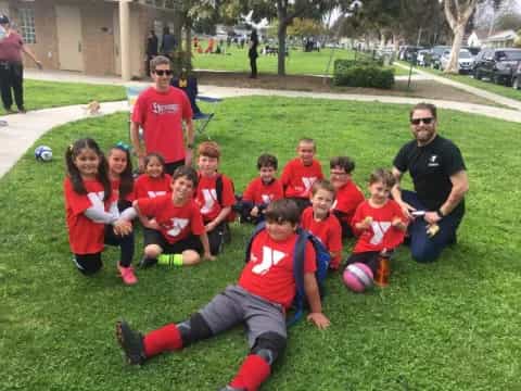 a group of people posing for a photo
