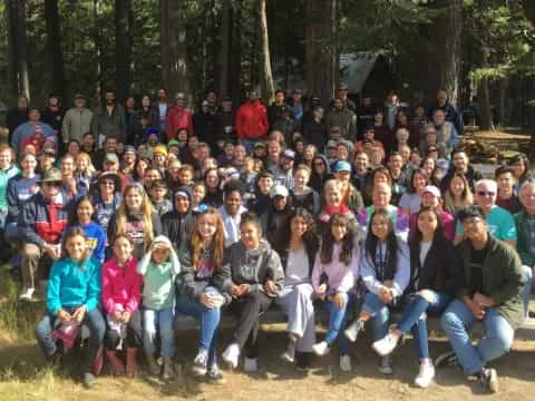 a group of people posing for a photo
