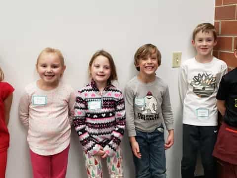 a group of children posing for a photo