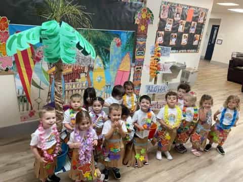 a group of children posing for a photo