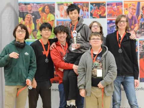 a group of people posing for a photo
