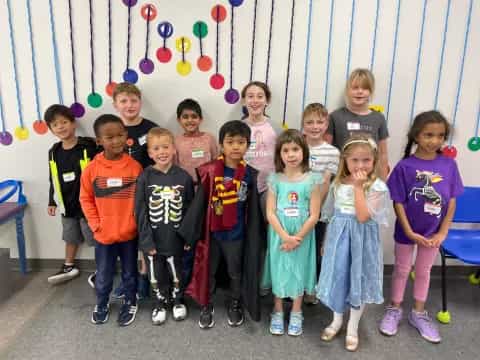 a group of children posing for a photo