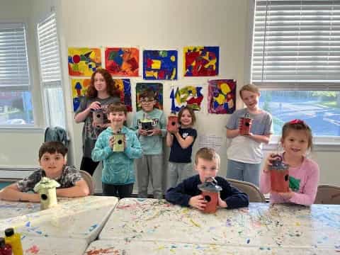 a group of children posing for a photo