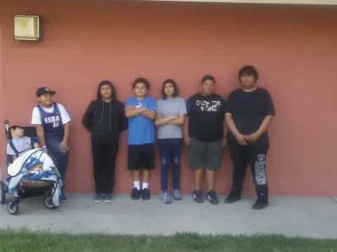a group of people posing for a photo