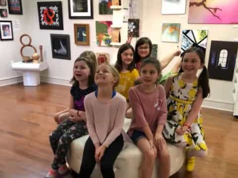 a group of people posing for the camera