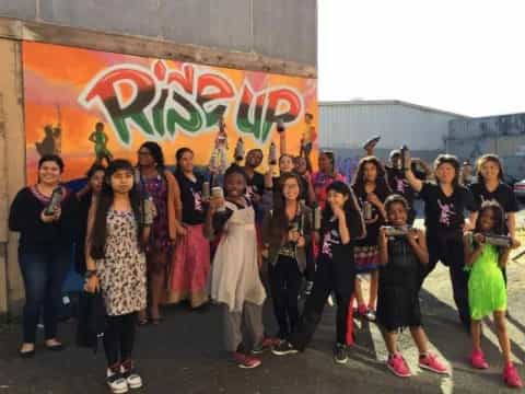 a group of people posing for a photo