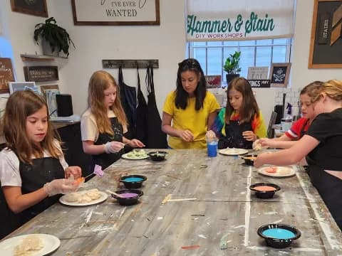 a group of women eating at a table