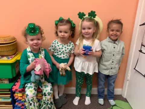 a group of children wearing clothing