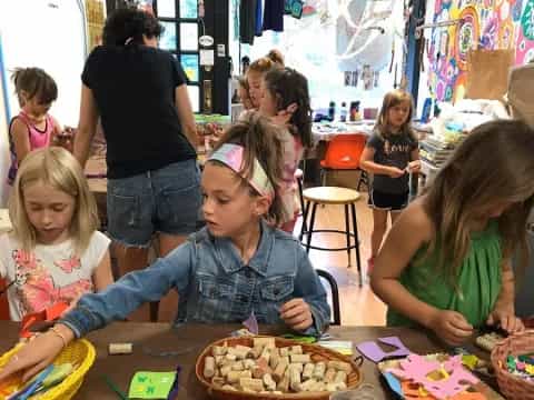 a group of children playing with cookies