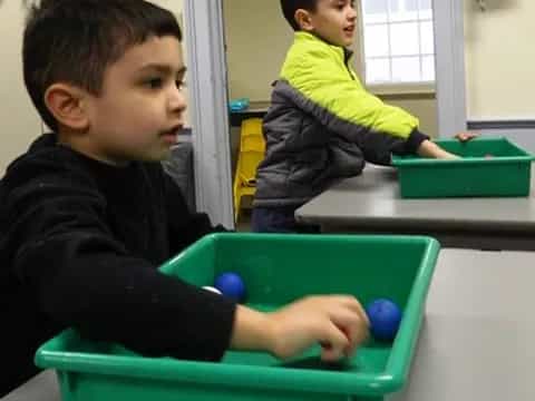 a few children playing with a ball