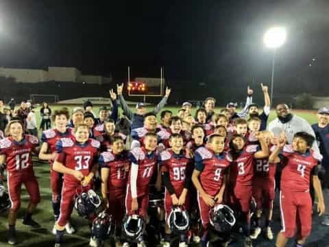 a football team posing for a photo