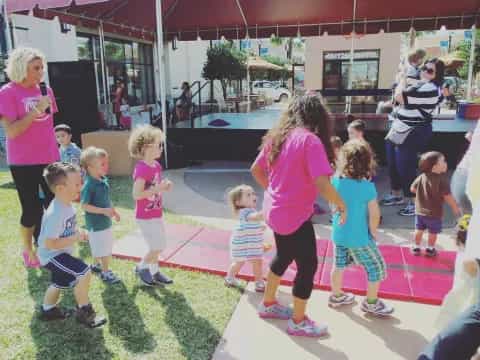 a group of children standing outside
