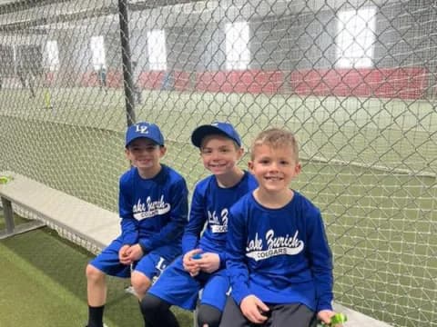 a group of boys posing for a picture