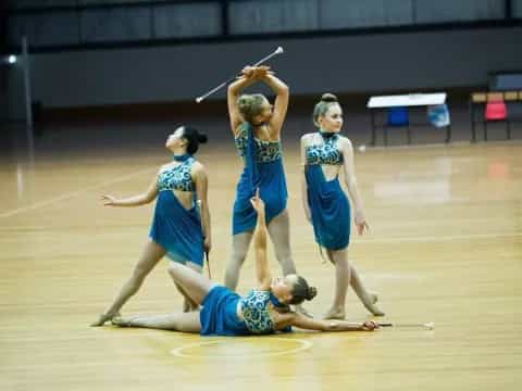 a group of women performing a dance