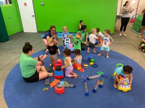 a group of children playing with toys