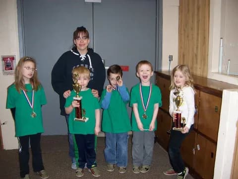 a group of children posing for a photo