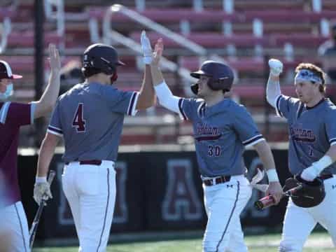 a group of baseball players celebrating