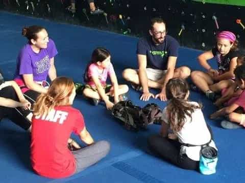 a group of people sitting on the floor