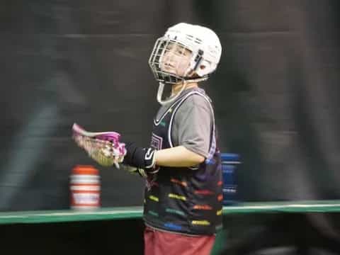 a person wearing a helmet and gloves