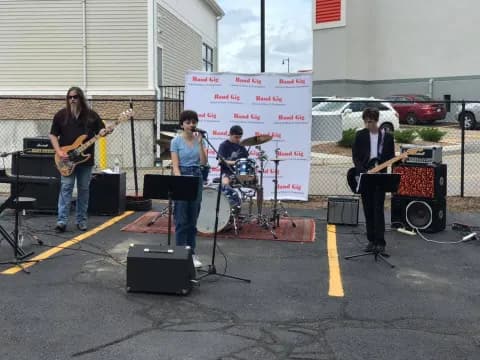 a group of people playing instruments