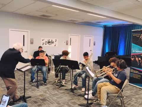 a group of people playing instruments
