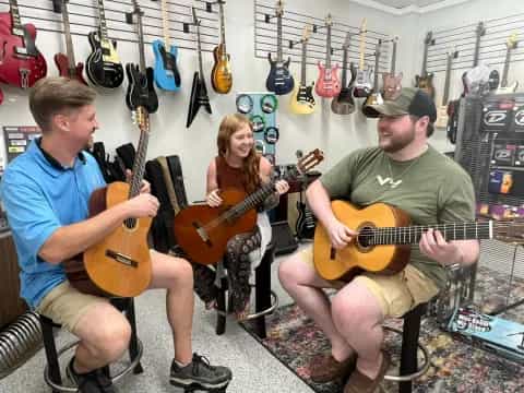 a group of people playing instruments