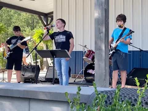 a group of people playing instruments