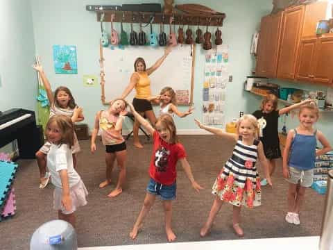 a group of children posing for a photo