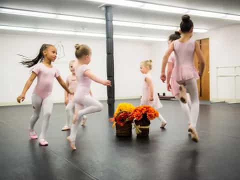 a group of women and a child running
