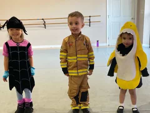 a group of children wearing clothing